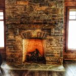 C4 Construction: Custom Cottage, stone fireplace