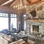 C4 Construction: Custom Cottage, cozy stone fireplace sitting area