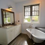 C4 Construction: custom home bathroom vanity and clawfoot tub